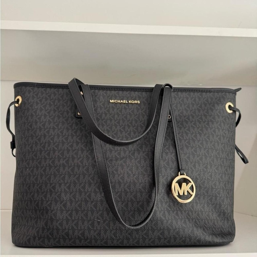 Michael Kors Black Tote with Gold Accents Chic black tote with signature MK